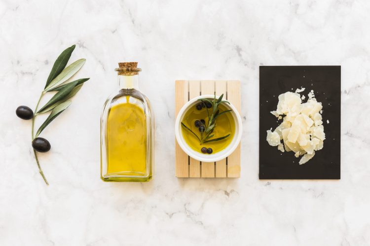 olive-black-pepper-oil-bowl-bottle-with-cheese-white-marble-backdrop olive-black-pepper-oil-bowl-bottle-with-cheese-white-marble-backdrop
